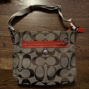 Coach women’s bag with orange trim